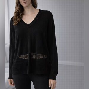 071. Diadora Luxe Collection black knit top.